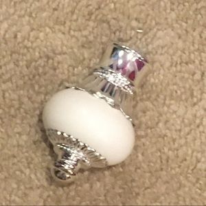 2 Filials (End Caps to a curtain rod).